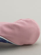 Pink golf club head cover with a pink yellow and blue plaid window