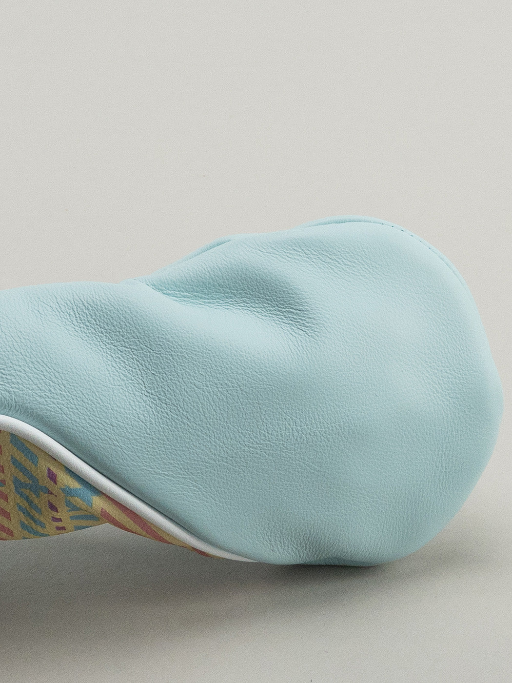 Blue leather headcover with yellow, pink and blue plaid window