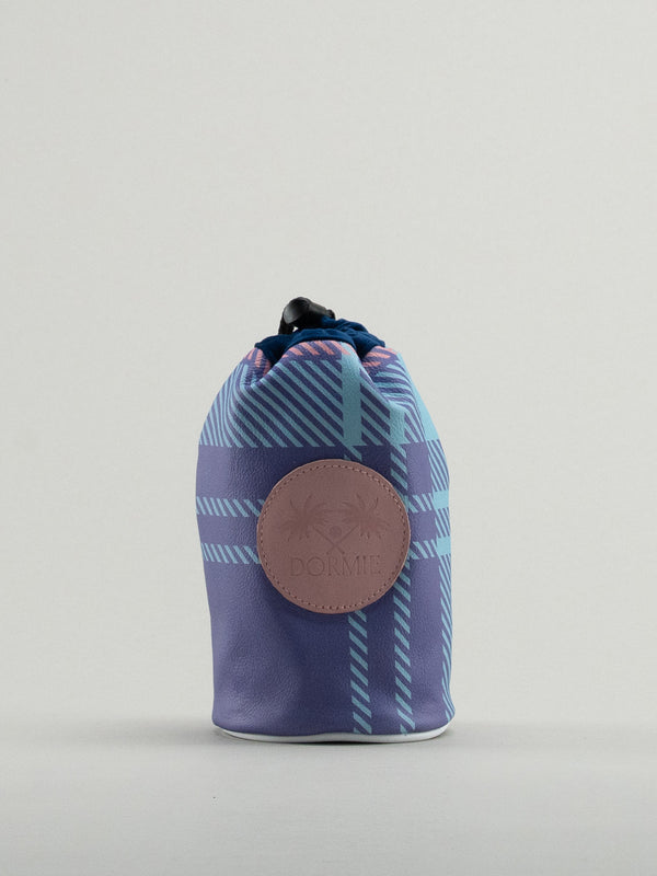 Blue and pink tartan bag showing leather badge with dormie embossed on it.