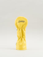 Yellow golf club headcover with Dormie workshop logo