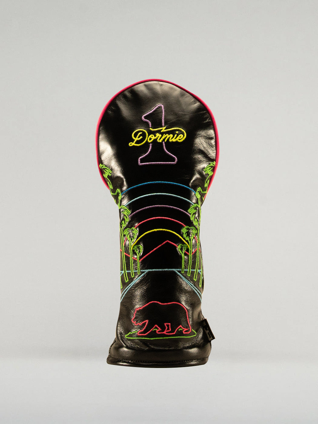 Neon Nights Golf club head cover with colorful design and 'Dormie' branding on a black background