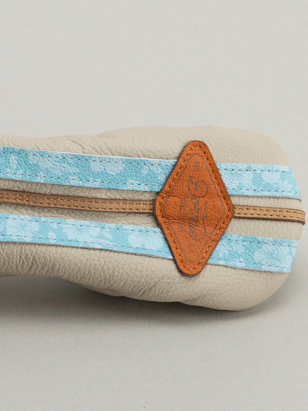 Closeup of Leather Golf headcover resembling a surfboard