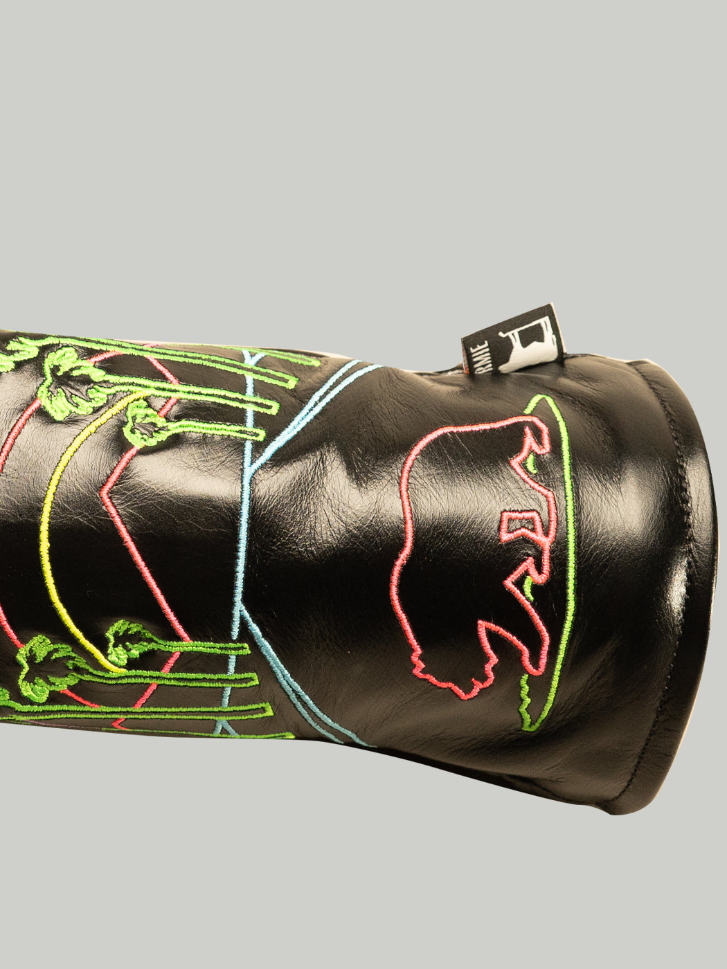 Neon Nights Golf club head cover with colorful design an a california flag style bear on a Black background